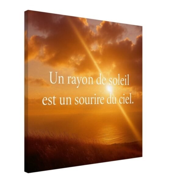 Toile murale avec coucher de soleil doré et citation “Un rayon de soleil est un sourire du ciel” – décoration chaleureuse et inspirante.